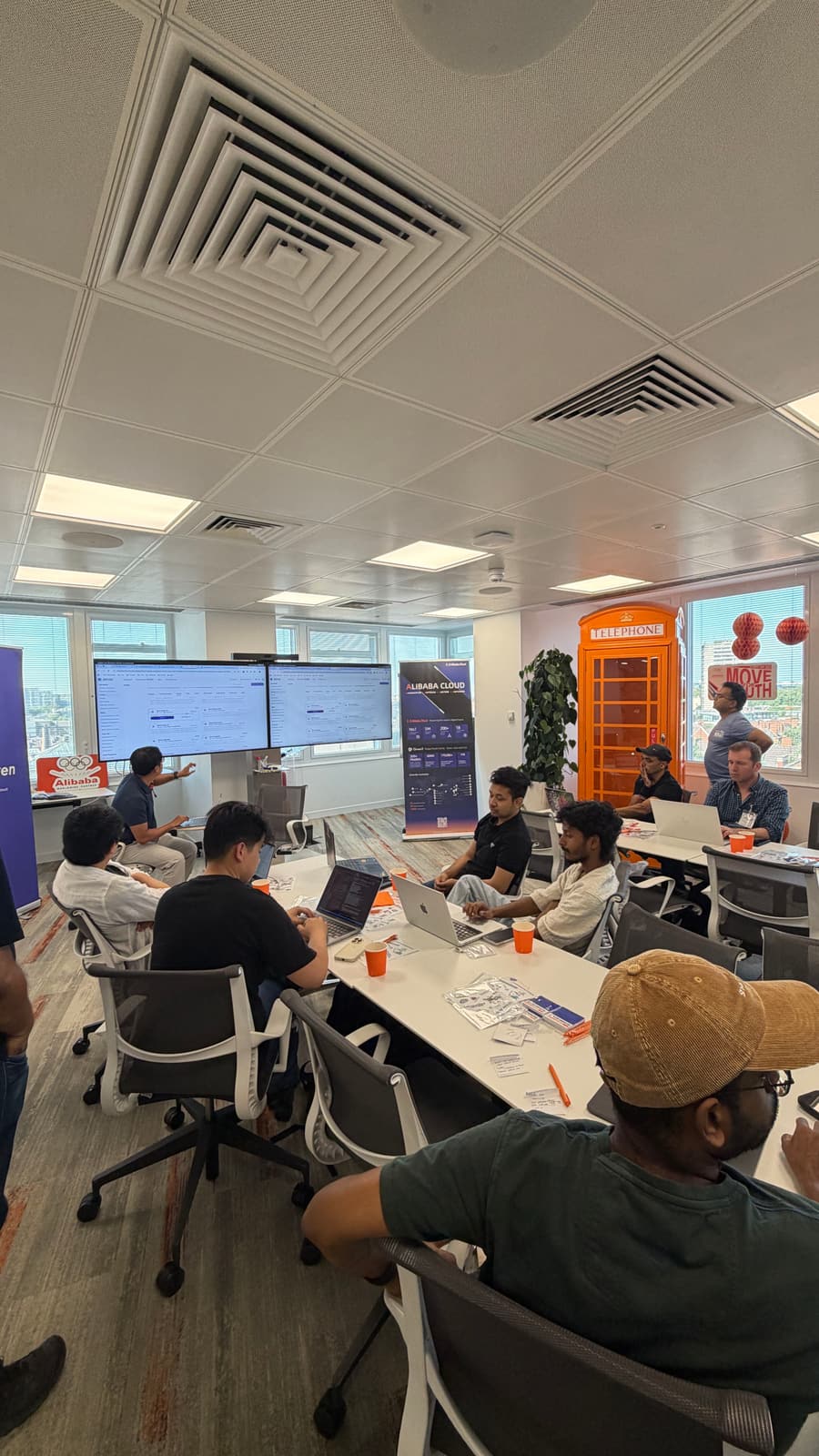 Teams presenting demos at the end of the hackathon day