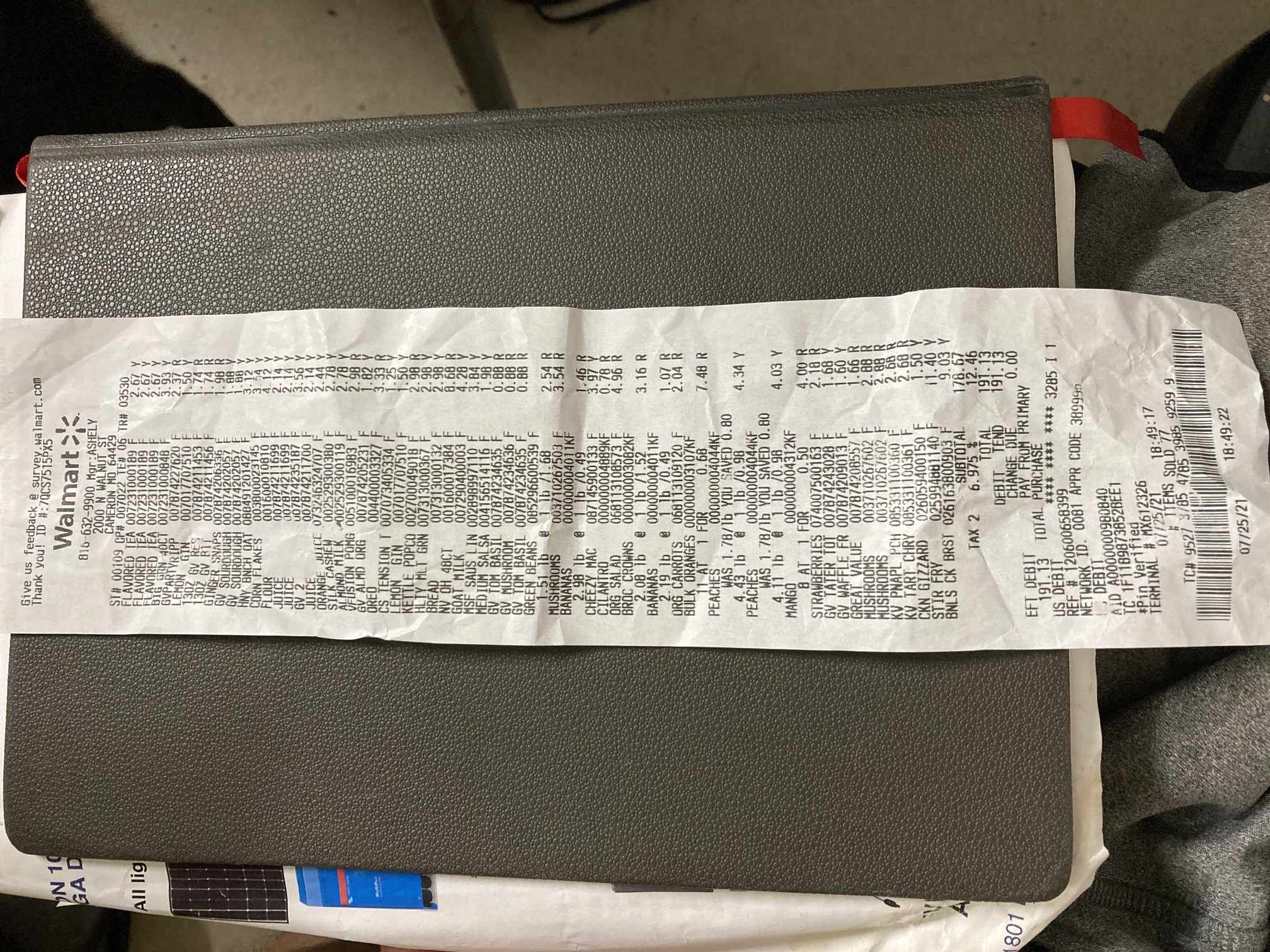Walmart grocery receipt, phone photo taken sideways