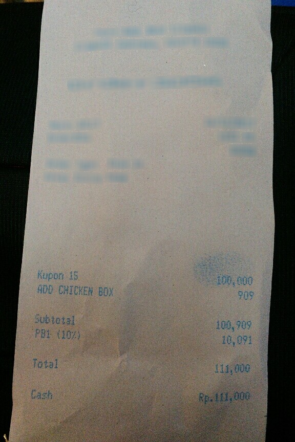 Faded thermal receipt from the CORD dataset